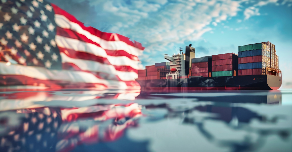 American flag next to container ship